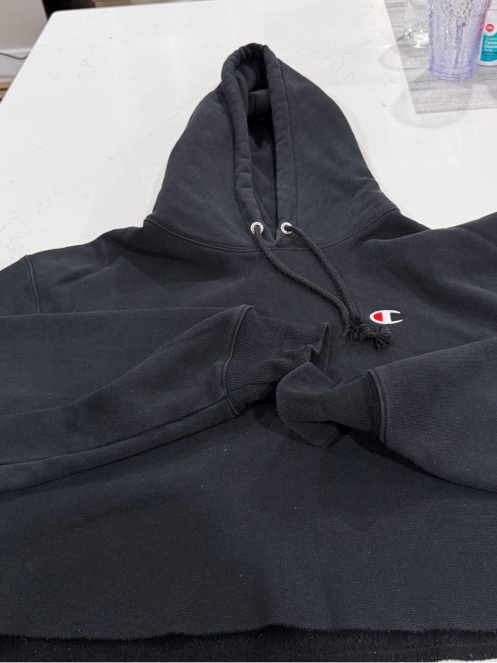 Champion Cropped Black Hooded Sweatshirt with Small Embroidered Logo